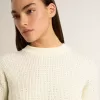Pulover cu guler rotund pentru femei, din lână merino albă, cu cristale pe toată suprafața Pulover cu guler rotund pentru femei, din lână merino albă, cu cristale pe toată suprafața