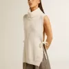 Pulover unisex alb, fără mâneci, cu guler înalt, din lână cu nervuri Pulover unisex alb, fără mâneci, cu guler înalt, din lână cu nervuri