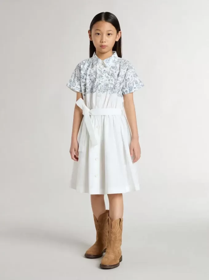 Rochie cămașă pentru fete din pânză de bumbac albă, cu imprimeu nautic albastru și bordură albă Rochie cămașă pentru fete din pânză de bumbac albă, cu imprimeu nautic albastru și bordură albă