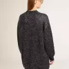 Rochie neagră pentru femei, cu guler rotund și paiete argintii pe toată suprafața Rochie neagră pentru femei, cu guler rotund și paiete argintii pe toată suprafața