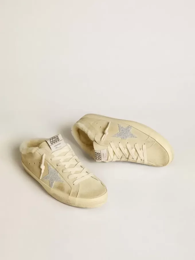 Saboturi Super-Star cu stea din cristal Swarovski și căptușeală din piele de oaie Saboturi Super-Star cu stea din cristal Swarovski și căptușeală din piele de oaie