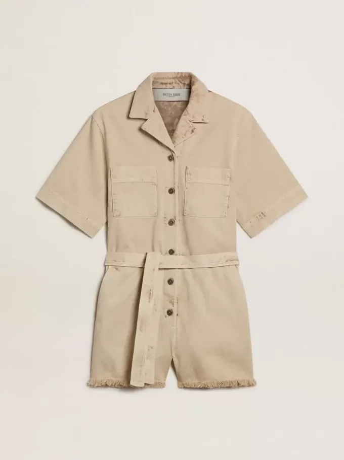 Salopetă pentru femei din denim bej, cu curea și tiv franjurat Salopetă pentru femei din denim bej, cu curea și tiv franjurat