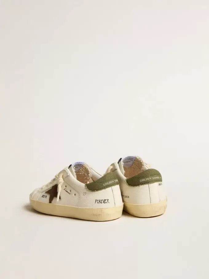 Super-Star Junior din piele nappa cu stea din piele întoarsă și talpă verde