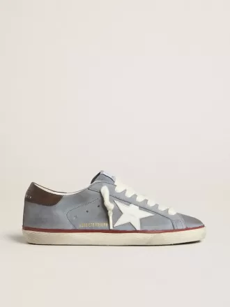Super-Star LTD din piele nubuc albastru deschis, cu stea din piele albă și călcâi din piele maro Super-Star LTD din piele nubuc albastru deschis, cu stea din piele albă și călcâi din piele maro