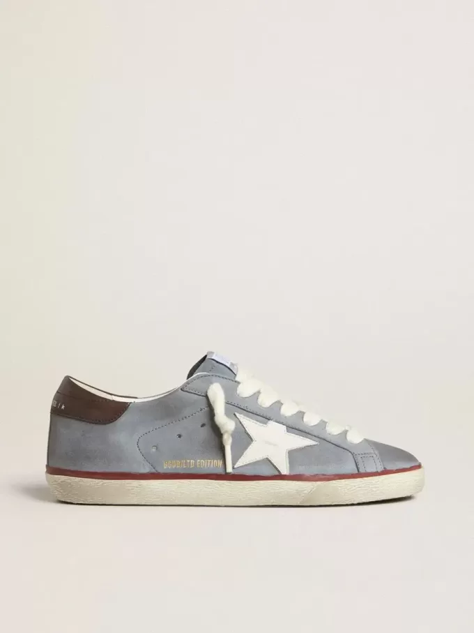 Super-Star LTD din piele nubuc albastru deschis, cu stea din piele albă și călcâi din piele maro Super-Star LTD din piele nubuc albastru deschis, cu stea din piele albă și călcâi din piele maro