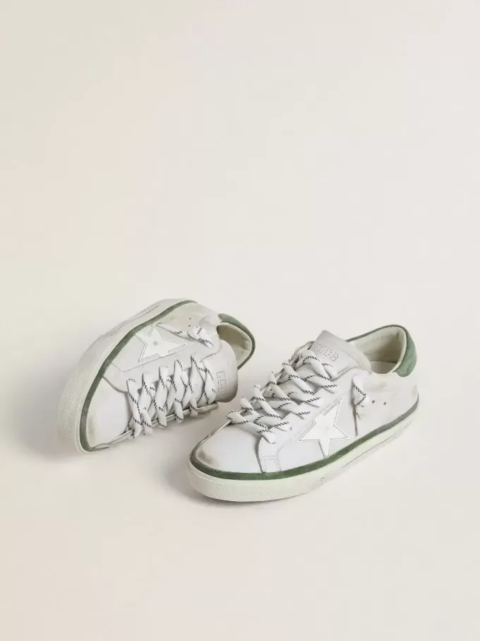 Super-Star LTD pentru femei, cu stea din piele albă și călcâi din piele de căprioară verde Super-Star LTD pentru femei, cu stea din piele albă și călcâi din piele de căprioară verde