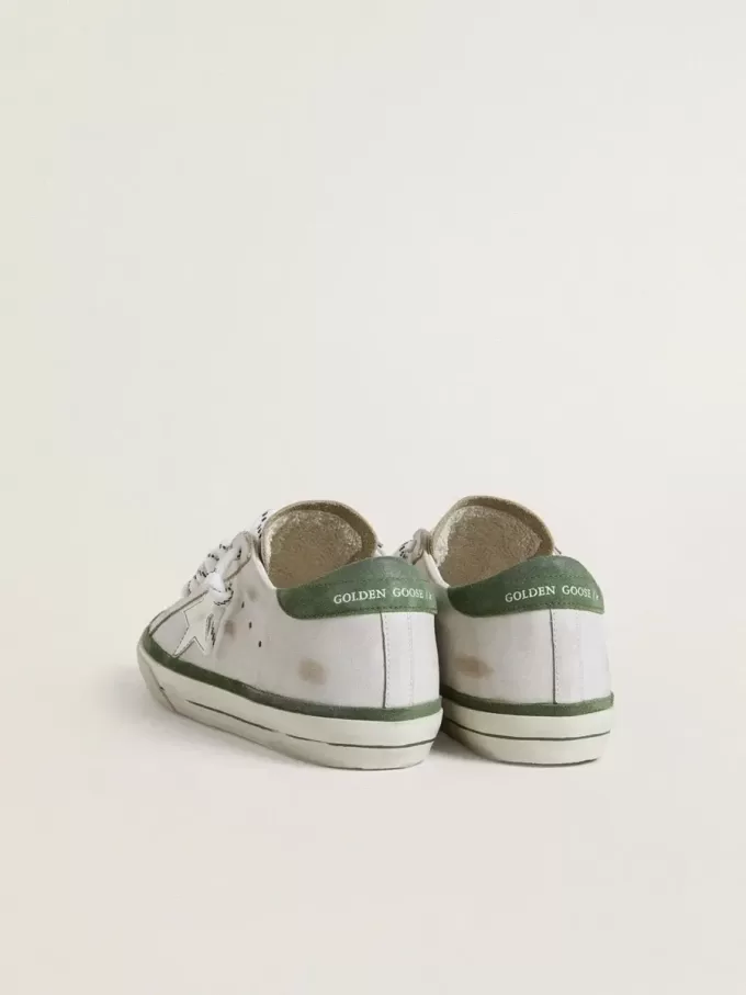 Super-Star LTD pentru femei, cu stea din piele albă și călcâi din piele de căprioară verde Super-Star LTD pentru femei, cu stea din piele albă și călcâi din piele de căprioară verde