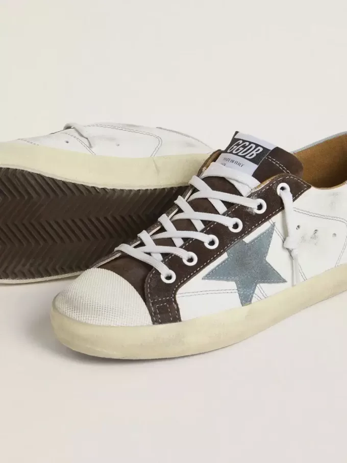 Super-Star LTD pentru femei, cu stea din piele de căprioară albastră deschisă și călcâi din pânză albastră deschisă Super-Star LTD pentru femei, cu stea din piele de căprioară albastră deschisă și călcâi din pânză albastră deschisă