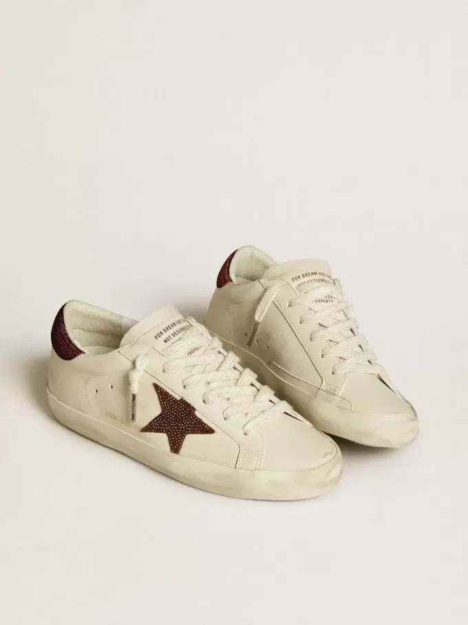 Super-Star LTD pentru femei, cu stea din piele întoarsă și călcâi cu cristale Swarovski Super-Star LTD pentru femei, cu stea din piele întoarsă și călcâi cu cristale Swarovski
