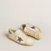 Super-Star LTD pentru femei, cu stea din piele întoarsă și călcâi cu cristale Swarovski Super-Star LTD pentru femei, cu stea din piele întoarsă și călcâi cu cristale Swarovski