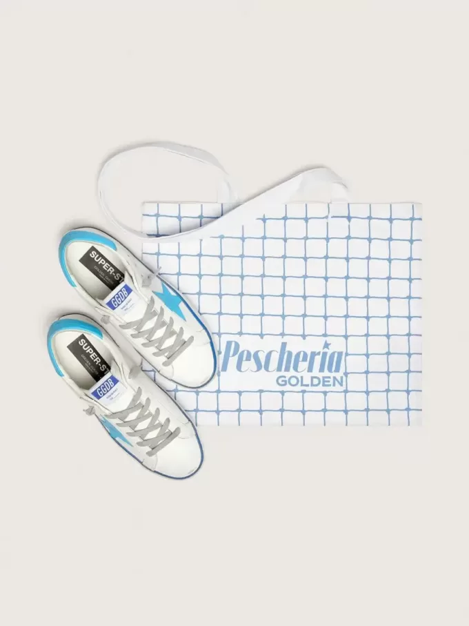 Super-Star LTD pentru femei, din piele albă, cu stea și călcâi din piele albastră deschisă Super-Star LTD pentru femei, din piele albă, cu stea și călcâi din piele albastră deschisă