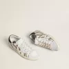 Super-Star LTD pentru femei, din piele de ponei albă cu sclipici maro și stea din piele de căprioară albă Super-Star LTD pentru femei, din piele de ponei albă cu sclipici maro și stea din piele de căprioară albă