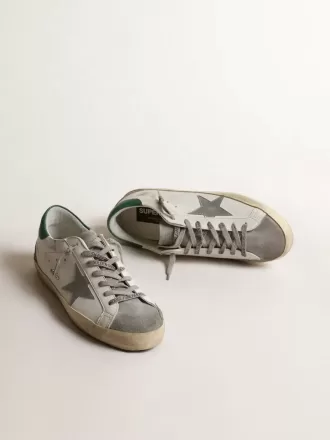 Super-Star pentru bărbați din piele albă, cu stea argintie și talpă verde Super-Star pentru bărbați din piele albă, cu stea argintie și talpă verde