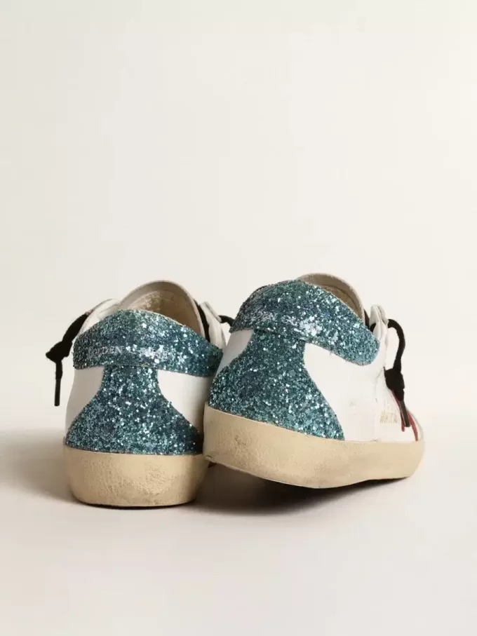 Super-Star pentru femei, cu stea din piele de căprioară burgund și talpă cu glitter albastru deschis Super-Star pentru femei, cu stea din piele de căprioară burgund și talpă cu glitter albastru deschis