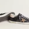 Super-Star pentru femei din piele nappa neagră cu stea din piele de ponei cu imprimeu zebră și călcâi din piele bej Super-Star pentru femei din piele nappa neagră cu stea din piele de ponei cu imprimeu zebră și călcâi din piele bej