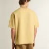Tricou oversized din bumbac galben pentru bărbați, cu imprimeu albastru Tricou oversized din bumbac galben pentru bărbați, cu imprimeu albastru