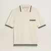 Tricou polo pentru bărbați, de culoare albă uzată, cu nervuri albastre Tricou polo pentru bărbați, de culoare albă uzată, cu nervuri albastre