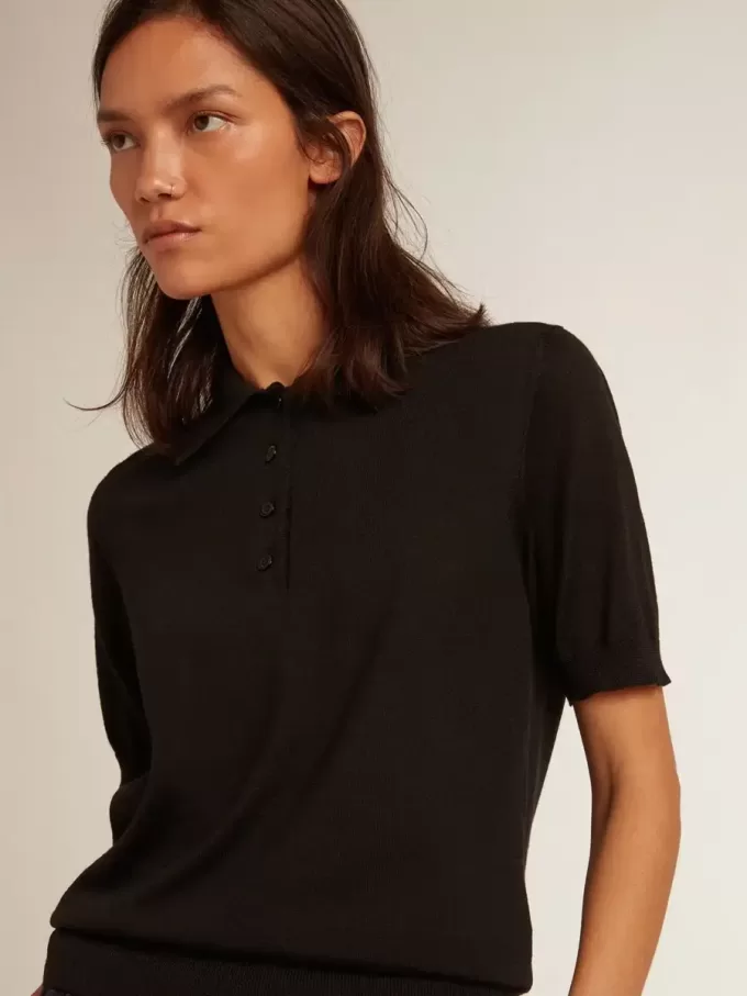 Tricou polo pentru femei din lână merino neagră Tricou polo pentru femei din lână merino neagră