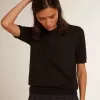 Tricou polo pentru femei din lână merino neagră Tricou polo pentru femei din lână merino neagră