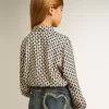 Tricou polo pentru fete cu imprimeu geometric Tricou polo pentru fete cu imprimeu geometric