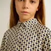 Tricou polo pentru fete cu imprimeu geometric Tricou polo pentru fete cu imprimeu geometric