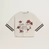 Tricou scurt oversized pentru femei, din jersey alb, cu broderie și imprimeu „Venezia Mediterraneo” Tricou scurt oversized pentru femei, din jersey alb, cu broderie și imprimeu „Venezia Mediterraneo”