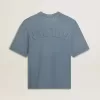 Tricou unisex din bumbac, de culoare albastru deschis, cu imprimeu inversat pe spate Tricou unisex din bumbac, de culoare albastru deschis, cu imprimeu inversat pe spate