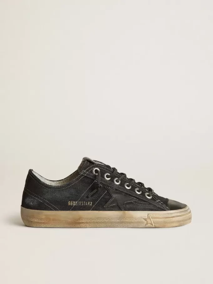 V-Star din denim albastru închis cu stea și vârf din piele neagră V-Star din denim albastru închis cu stea și vârf din piele neagră