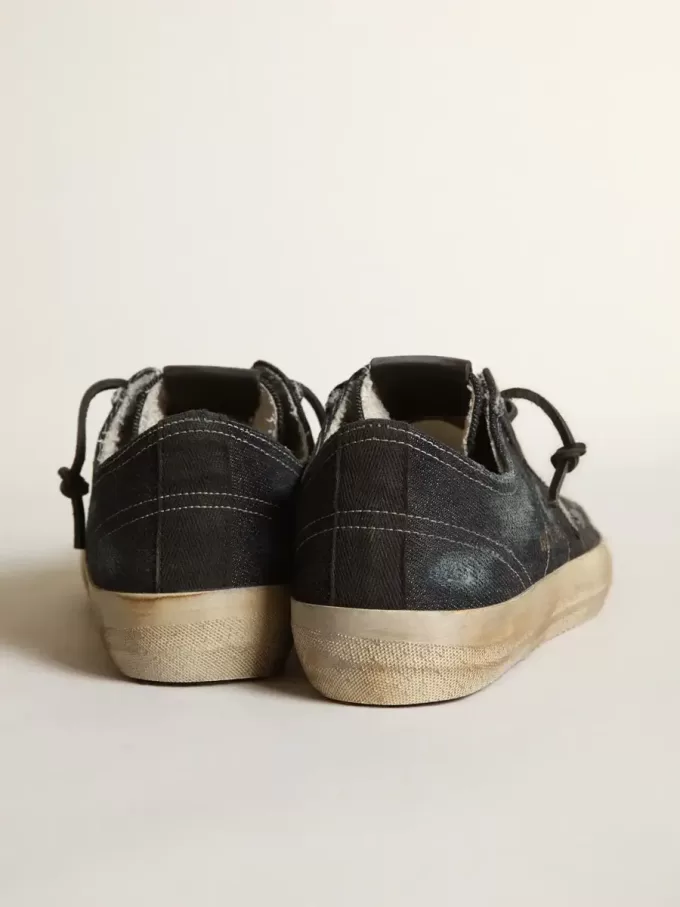 V-Star din denim albastru închis cu stea și vârf din piele neagră V-Star din denim albastru închis cu stea și vârf din piele neagră