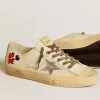 V-Star din piele nappa ecru cu stea din piele nappa argintie și broderie cu mărgele V-Star din piele nappa ecru cu stea din piele nappa argintie și broderie cu mărgele